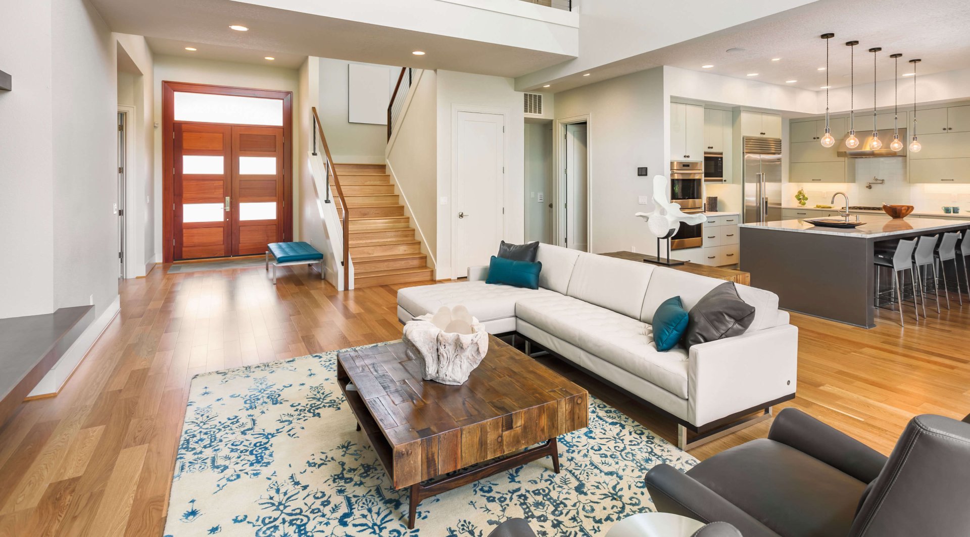 Clean modern open-concept living room and kitchen